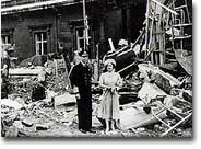 King George VI and Queen Elizabeth in September 1940, standing in the ruins of the former private chapel at Buckingham Palace, from which The Queen's Gallery was constructed